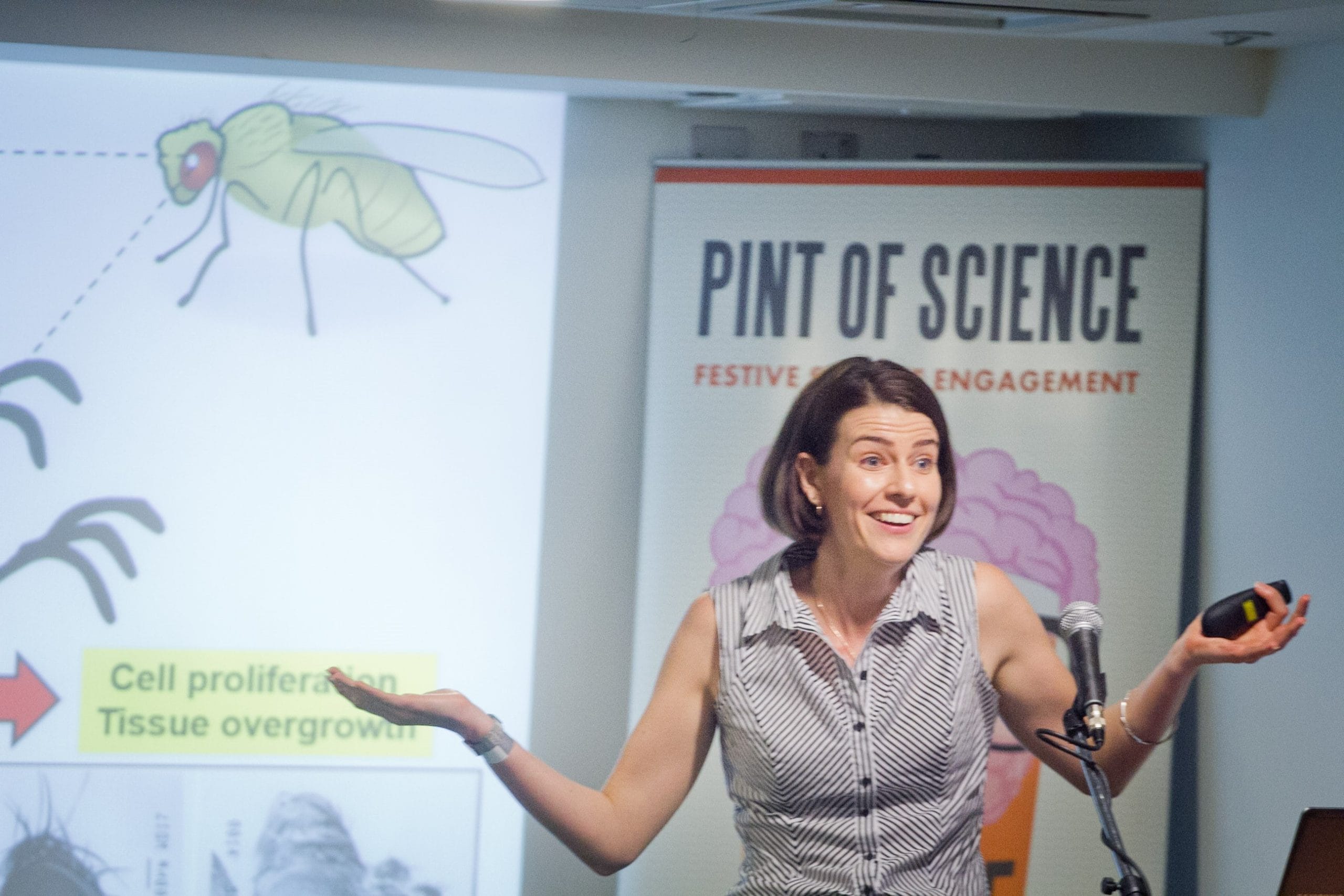 Aussie Scientist Dr Rachael Barry of Imperial College London explaining how fruit flies can be used to model undead cells. Photo credit: The London Lens Project.